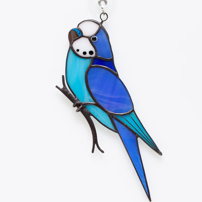 Stained glass blue budgie on the branch suncatcher