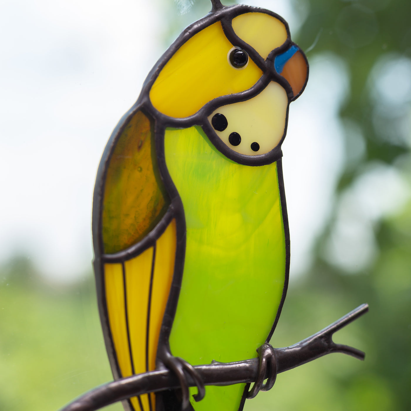 Zoomed stained glass green budgie window hanging