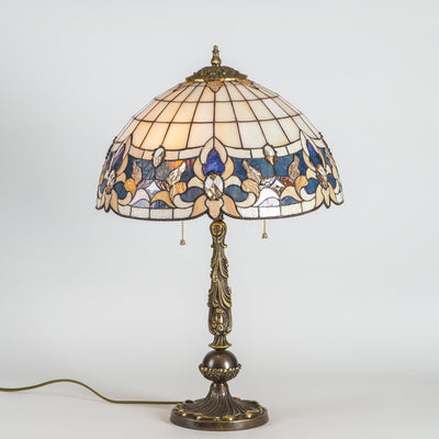 Stained glass Tiffany lamp in beige colours with blue inserts