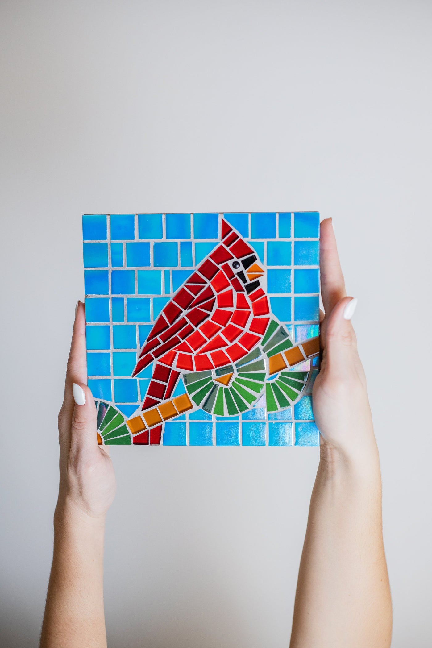 Glass mosaic red winter bird pattern