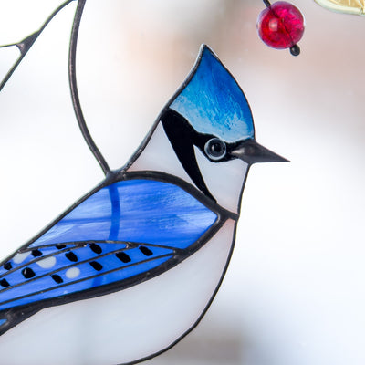 Zoomed stained glass blue jay suncatcher