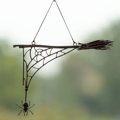 Halloween spider web with the broom window hanging