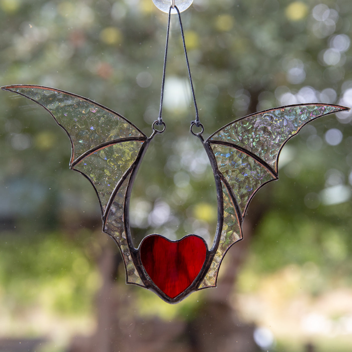 Iridescnent-winged stained glass red heart Halloween suncatcher