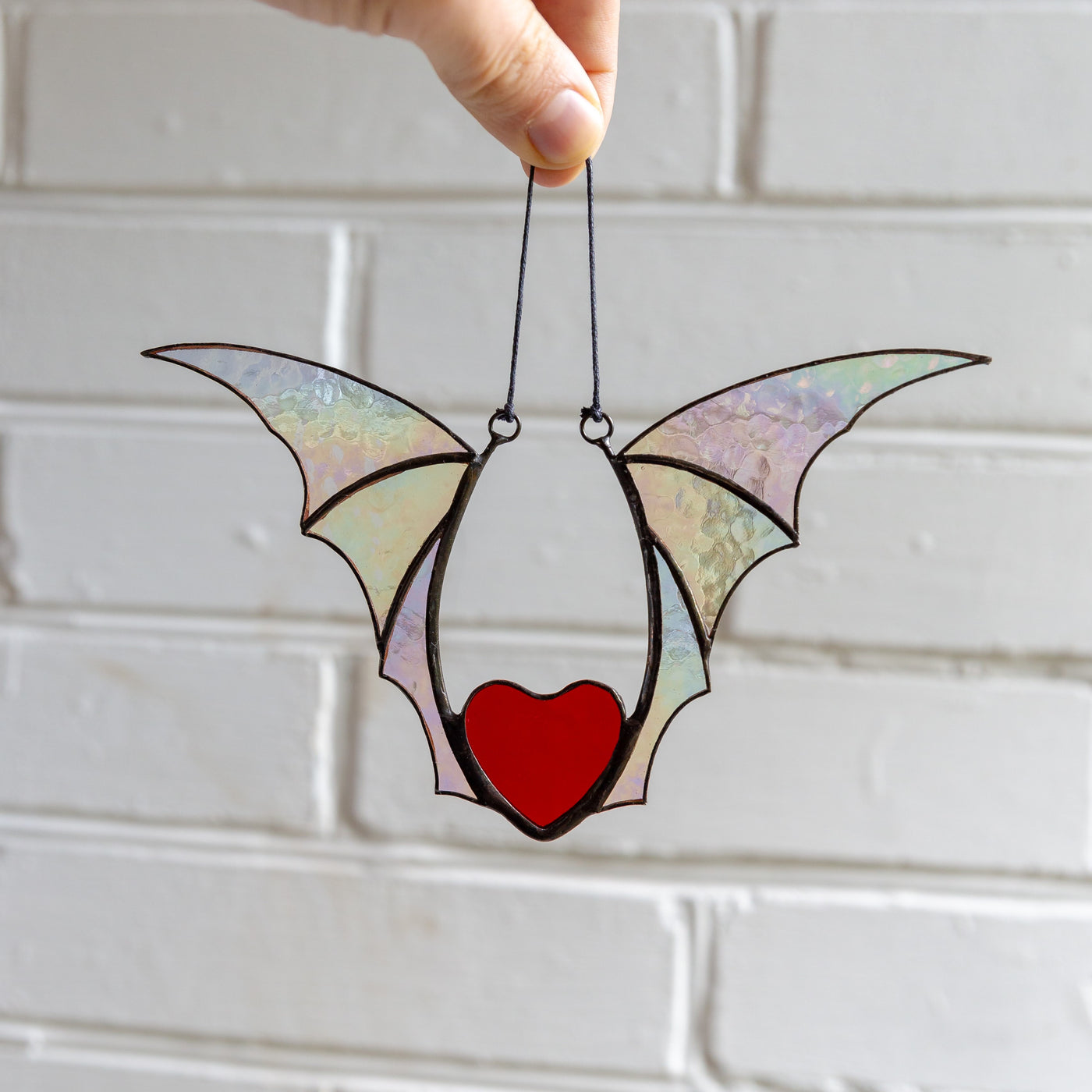 Halloween red stained glass heart with iridescent wings window hanging