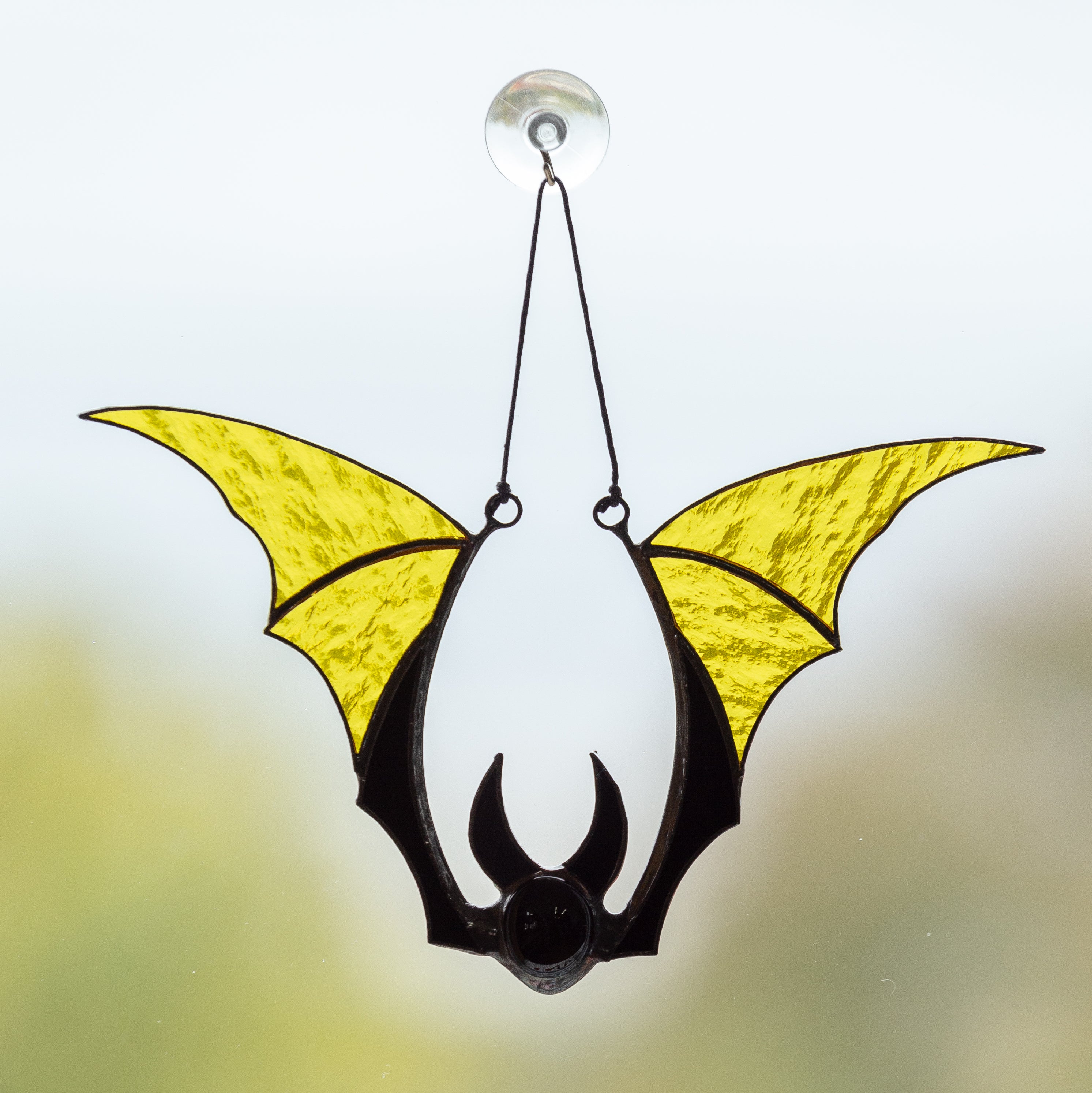 Yellow bat horror window hanging for Halloween