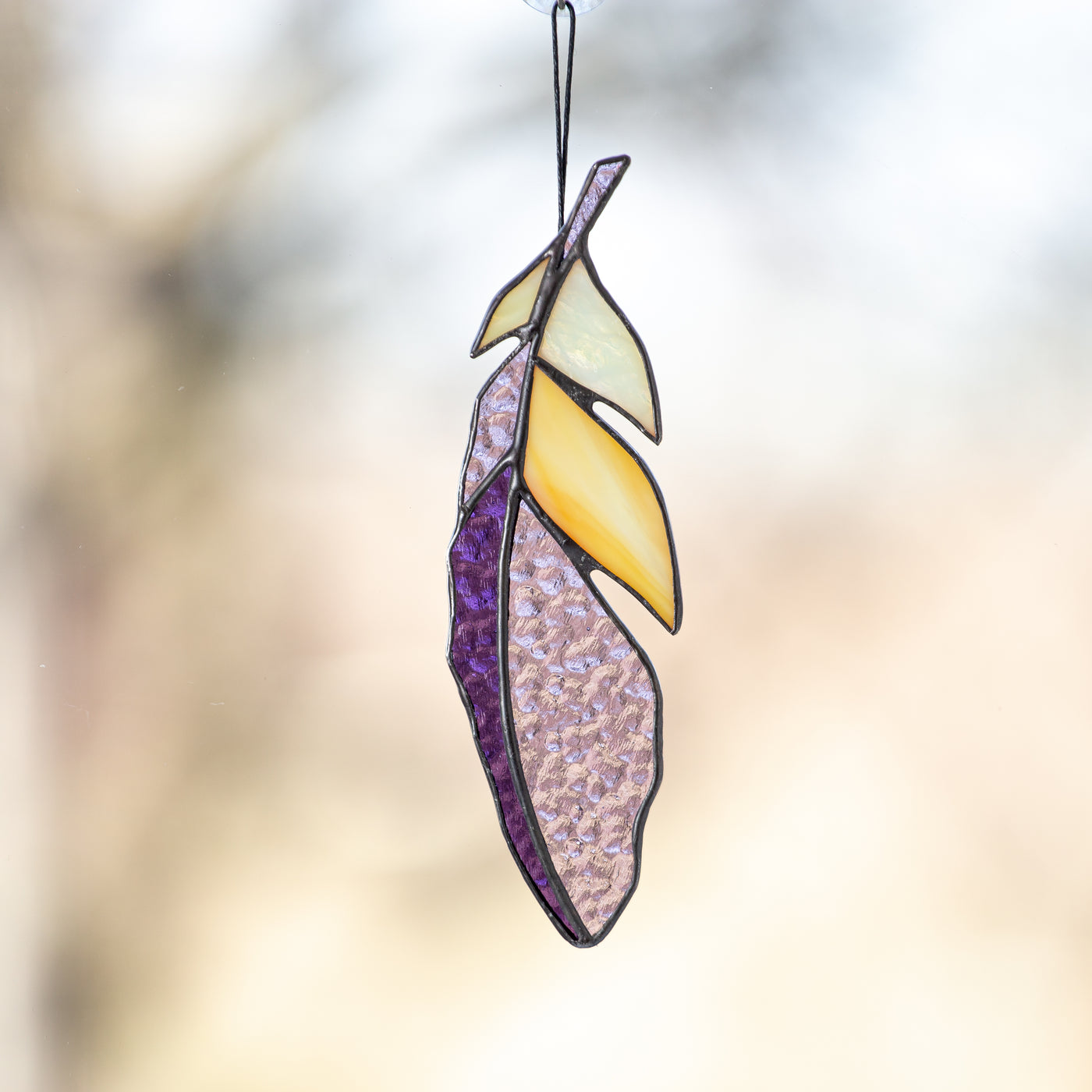 Purple with yellow parts stained glass feather suncatcher for window decoration