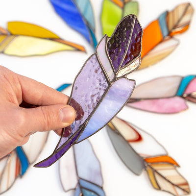 Purple feather suncatcher of stained glass