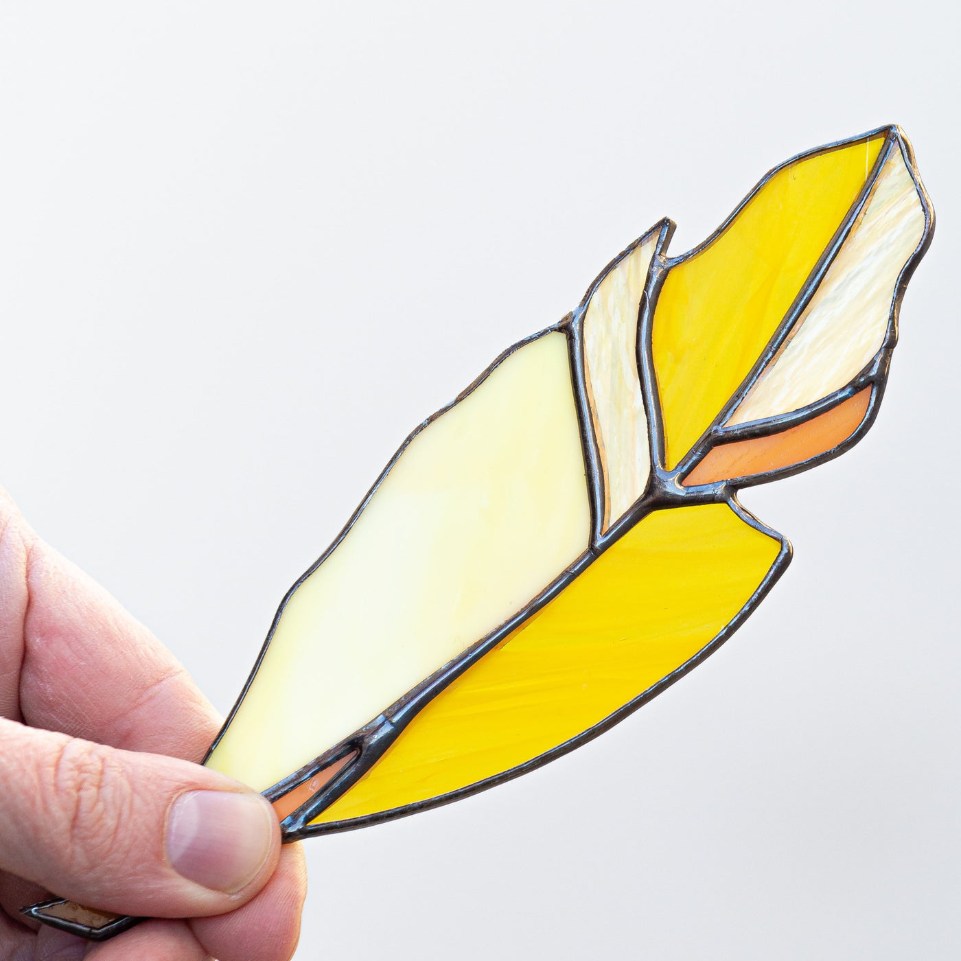 Stained glass yellow shades feather suncatcher or window decoration