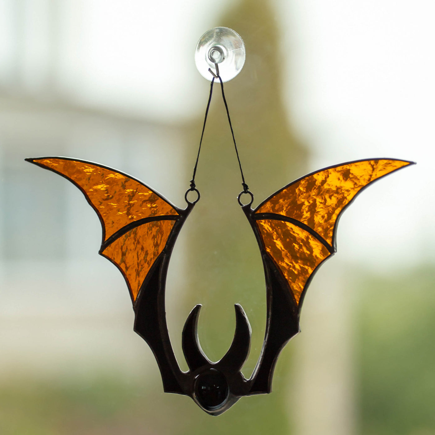 Brown stained glass bat window hanging