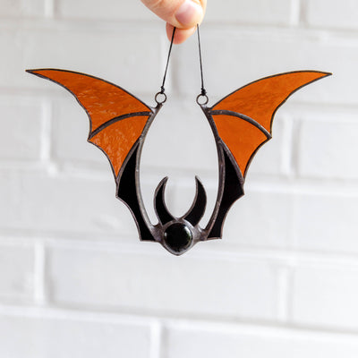 Brown-winged stained glass bat Halloween window hanging 
