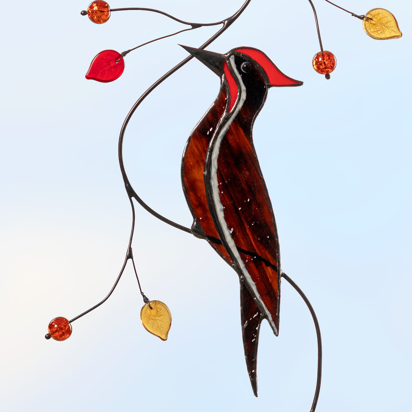Pileated woodpecker on the branch stained glass suncatcher  Edit alt text