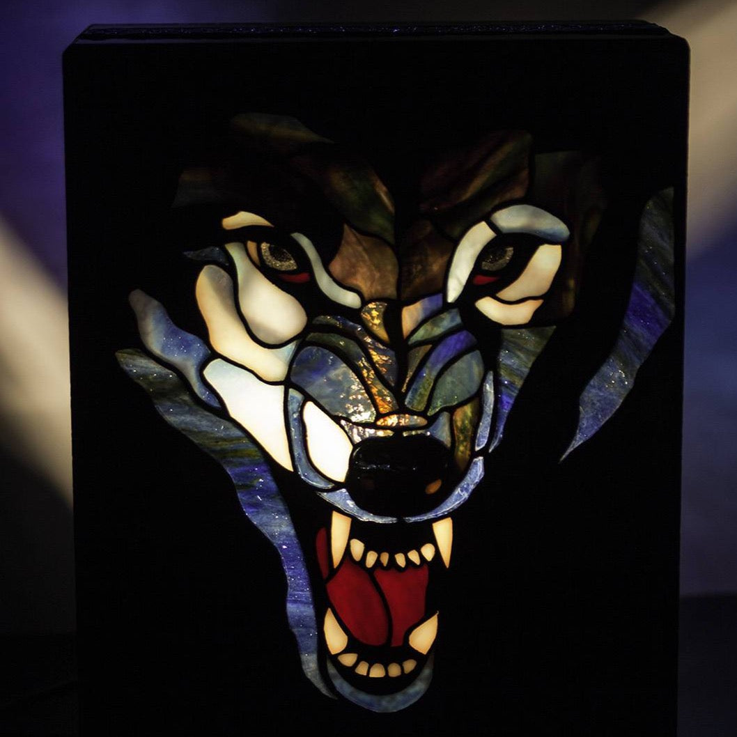 Zoomed stained glass wolf showing his fangs lamp
