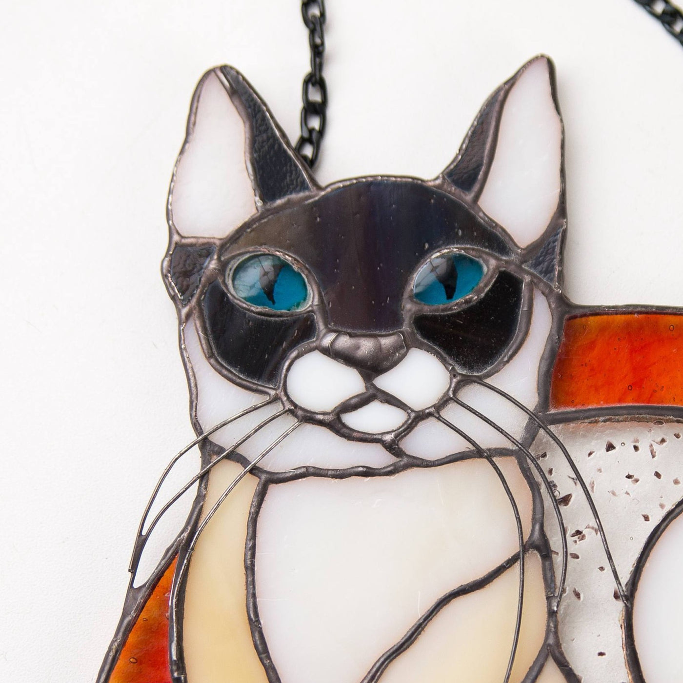 Zoomed stained glass Siamese cat panel