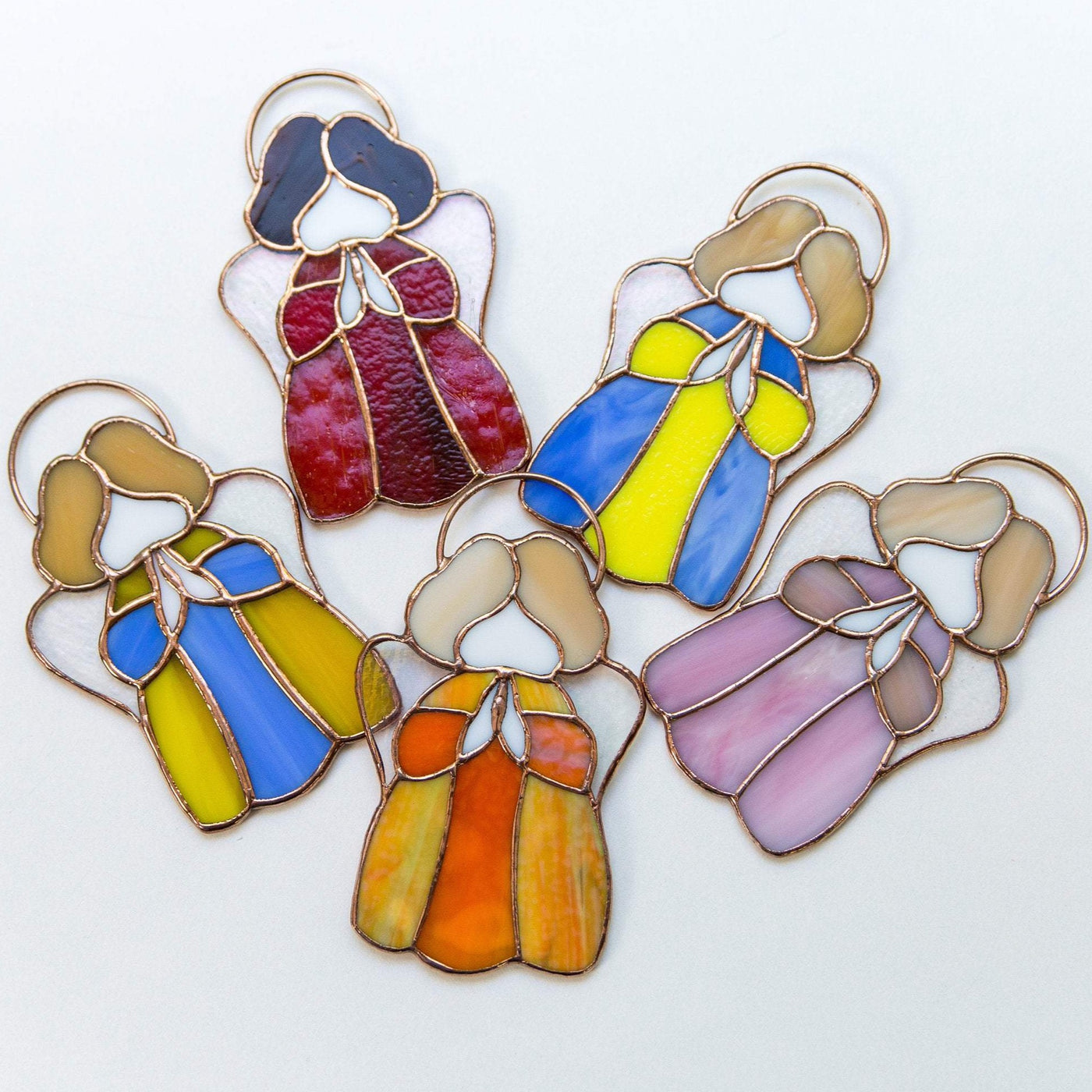Five stained glass colourful angels suncatchers