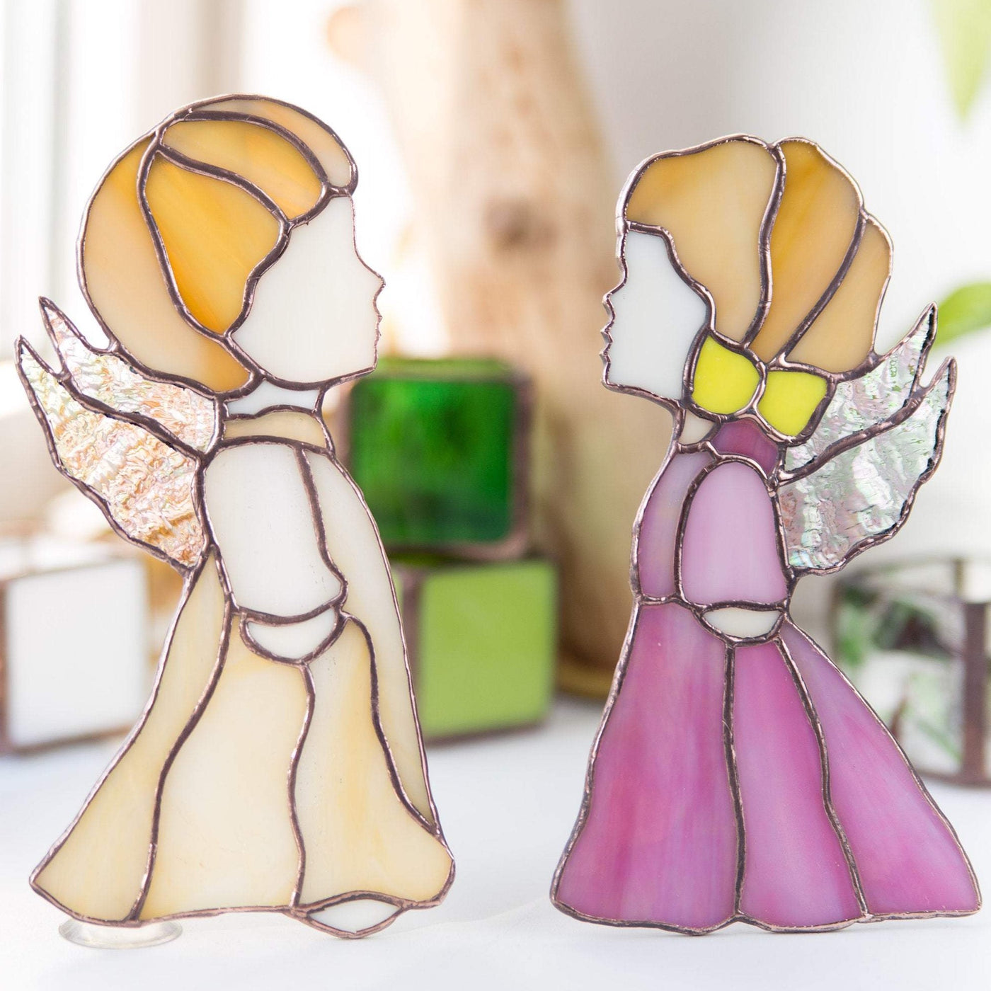 Stained glass angel beige boy angel and  pink girl angel suncatchers