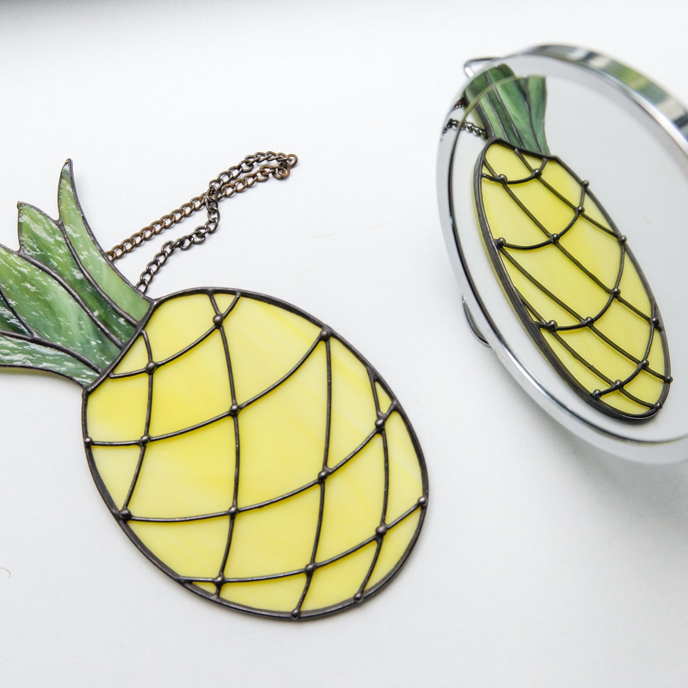 Window hanging of a stained glass pineapple for home decoration
