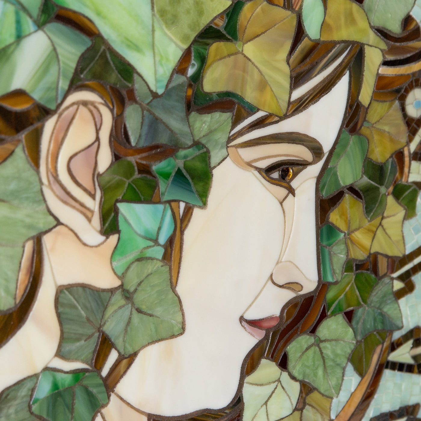Zoomed stained glass beautiful woman in ivy leaves by Alphones Mucha