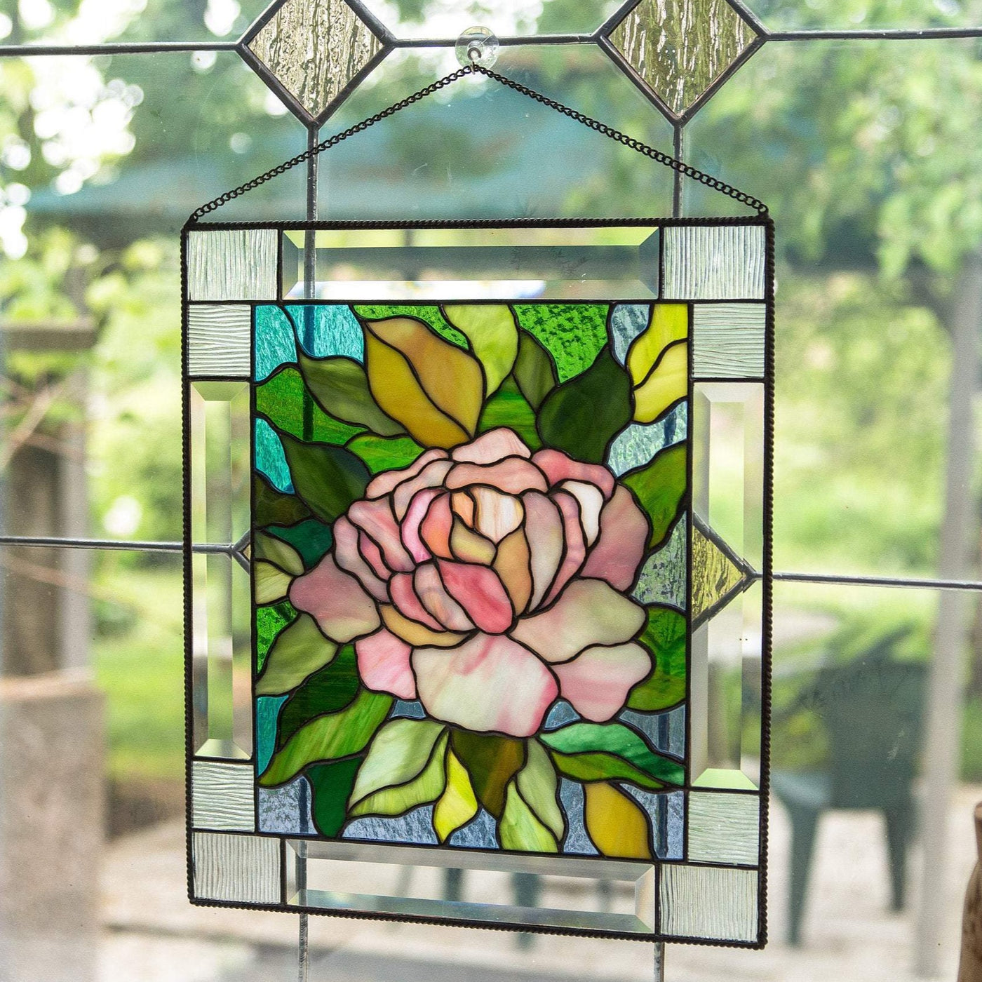 Stained glass pink peony with leaves on the background panel
