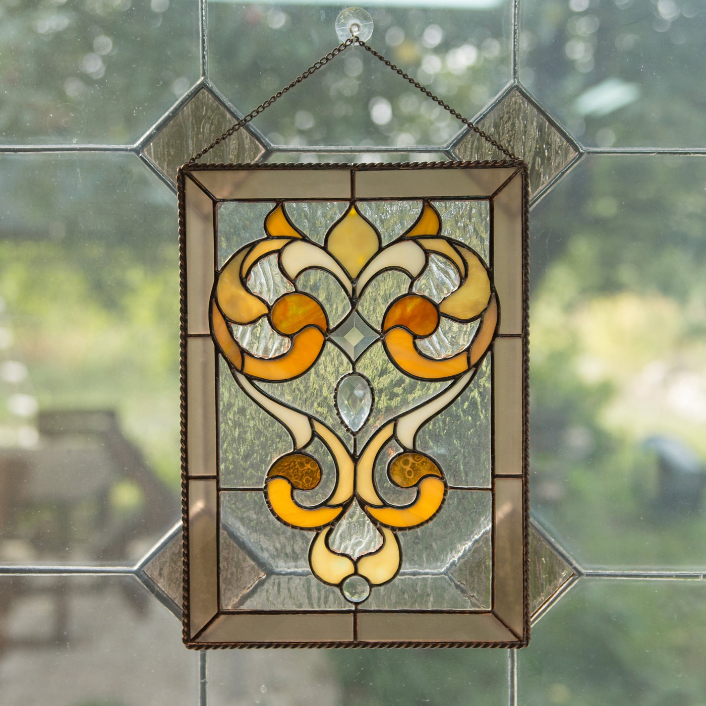 Stained glass clear panel with saturated beige ringlets 