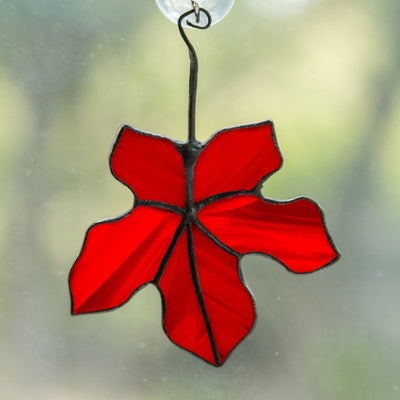Red stained glass maple leaf window hanging 