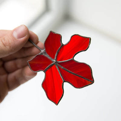 Red maple leaf window hanging of stained glass 