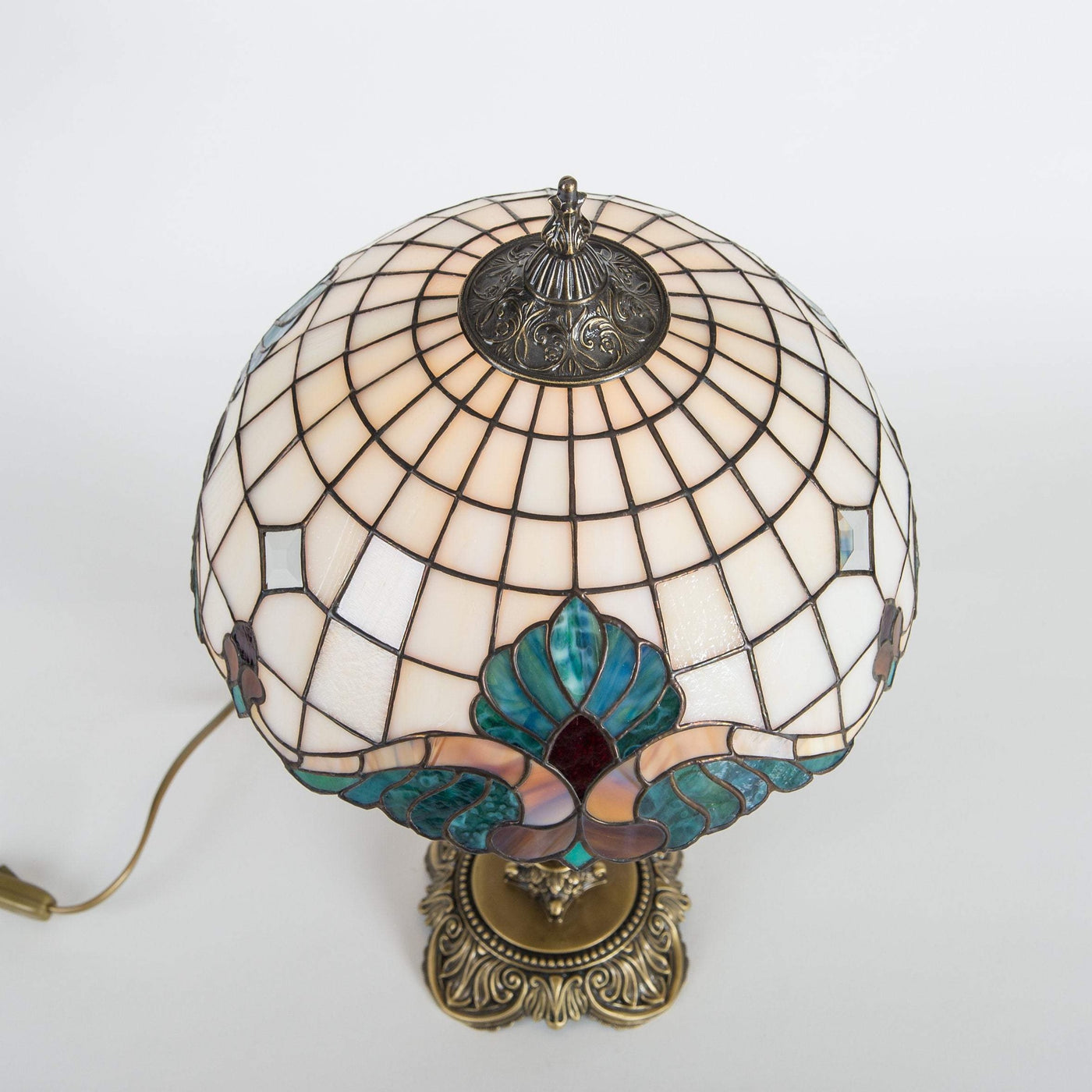 Top view of stained glass white and beige Tiffany lamp