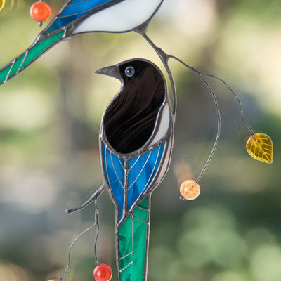 Zoomed stained glass magpie window hanging