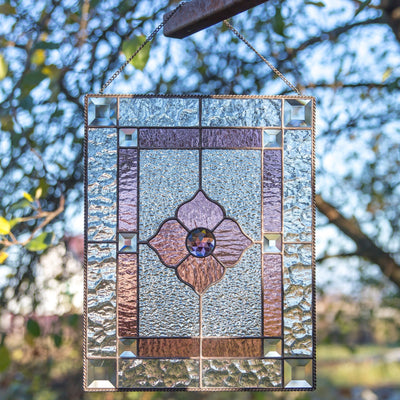 Stained glass panel with pink and clear beveled inserts