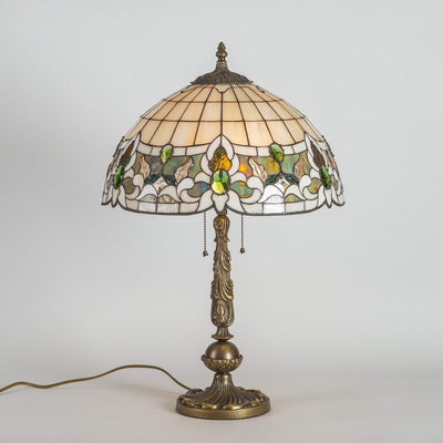 Stained glass Tiffany lamp of beige and green colours for home decor