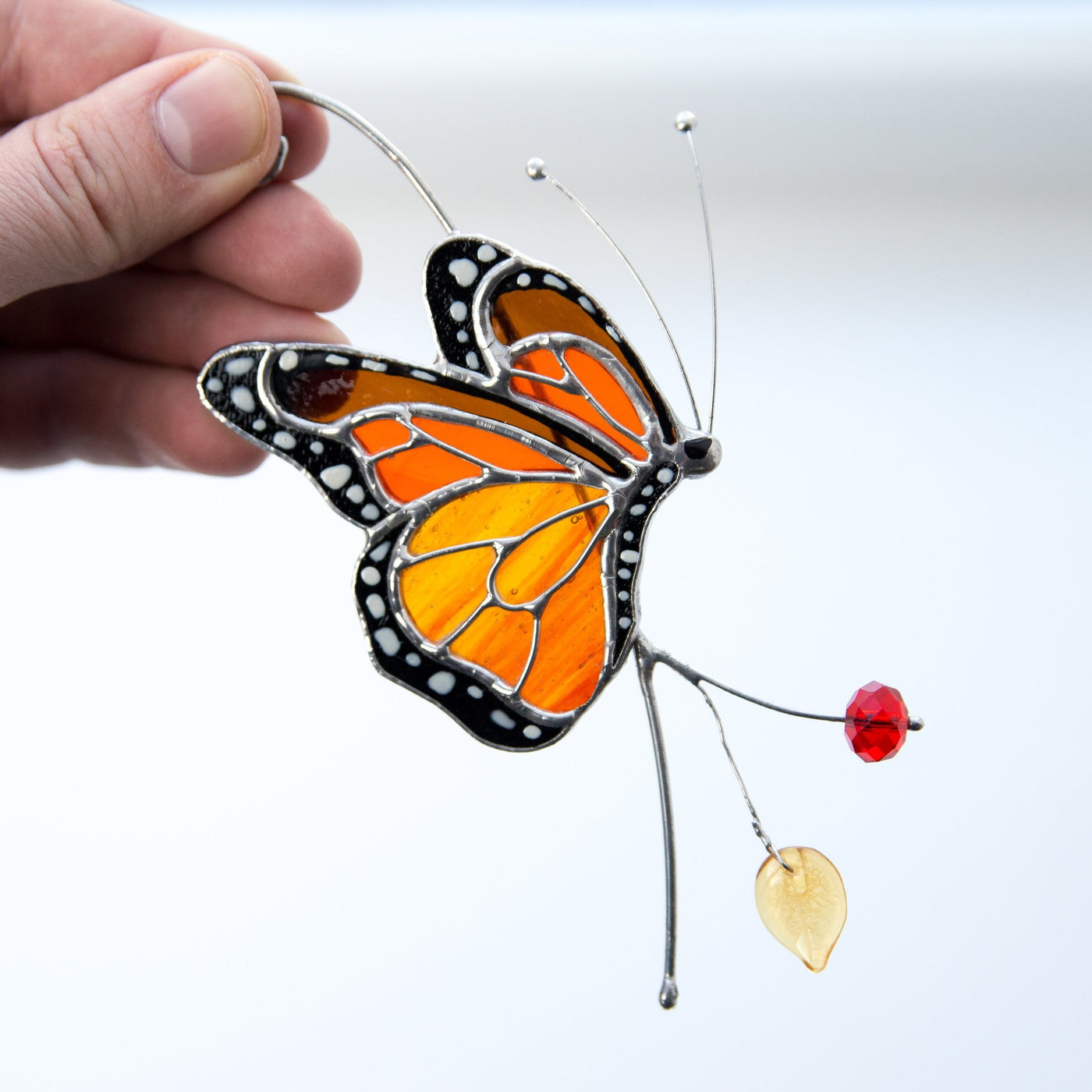Side view monarch butterfly stained glass window hanging