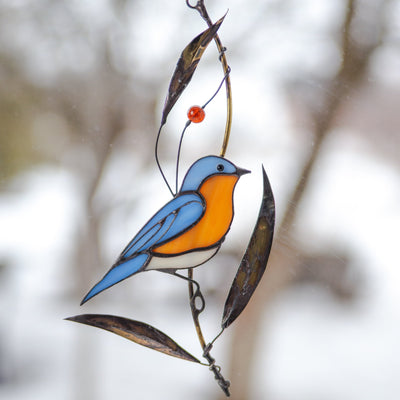 Bluebird with bass leaves stained glass window hanging