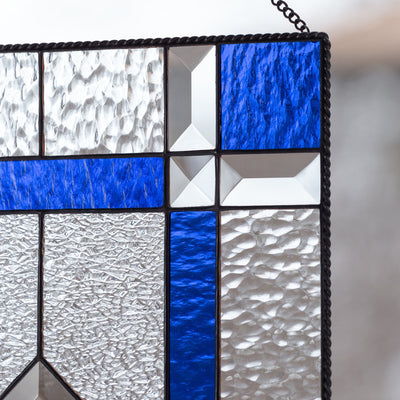 Zoomed stained glass clear and cobalt panel with beveled inserts