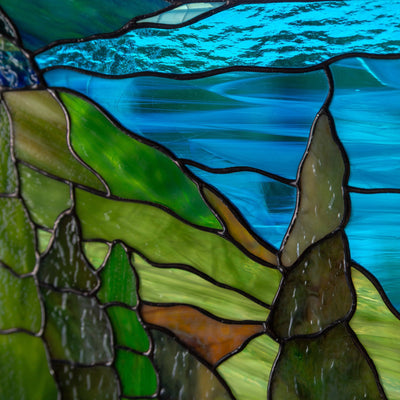 Zoomed stained glass panel of cape Breton highlands national park