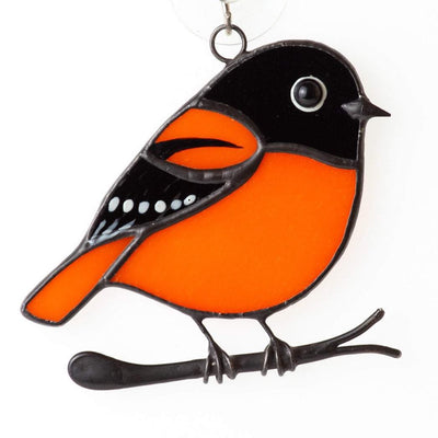Baltimore oriole window hanging of stained glass