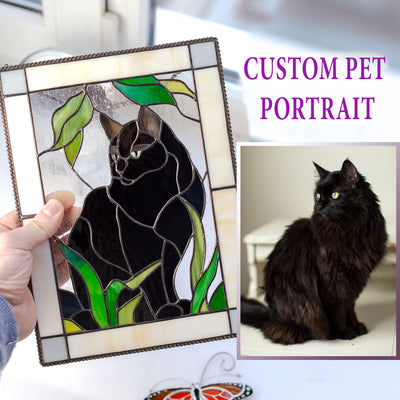 Rectangular stained glass panel of a black cat 