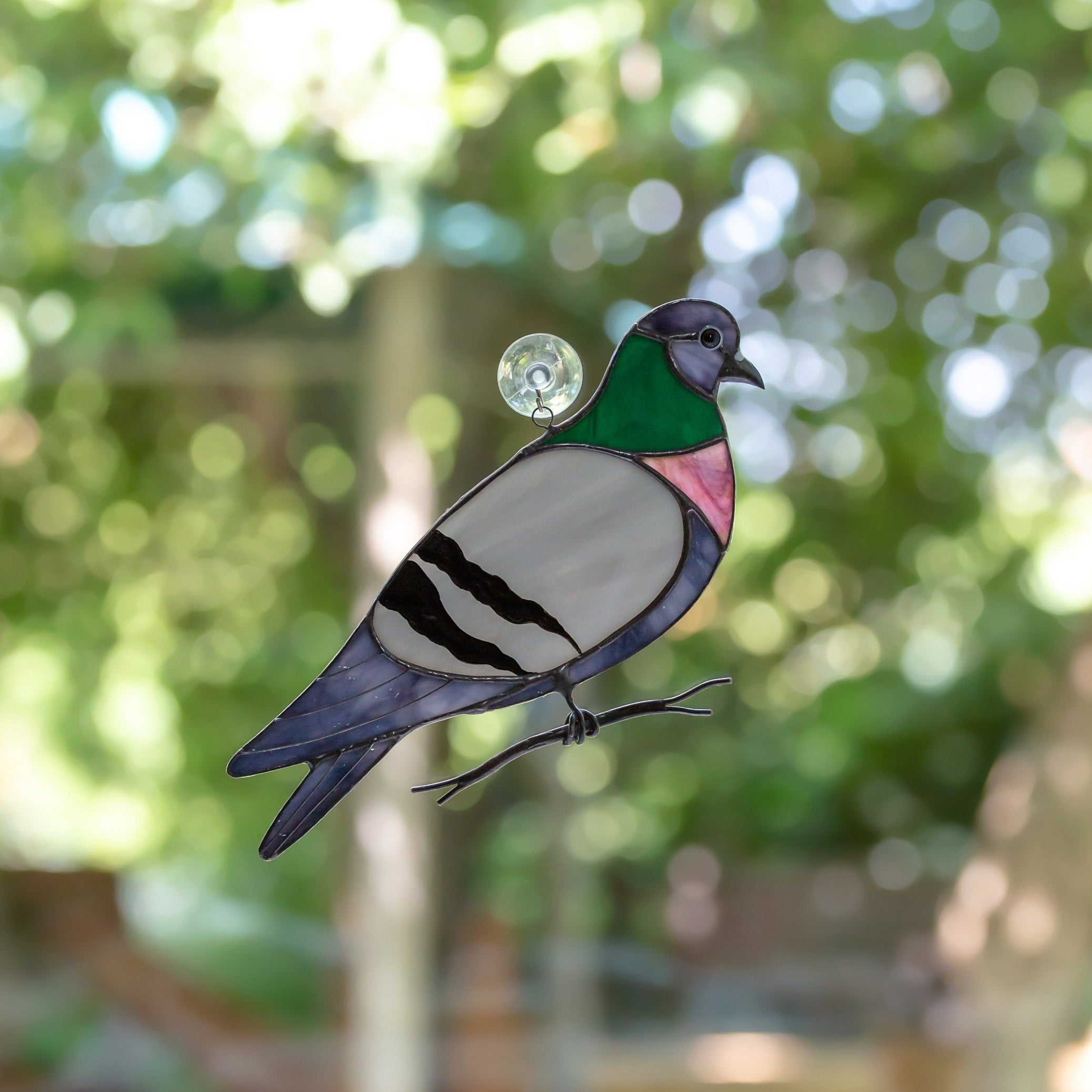 Stained glass pigeon window hanging