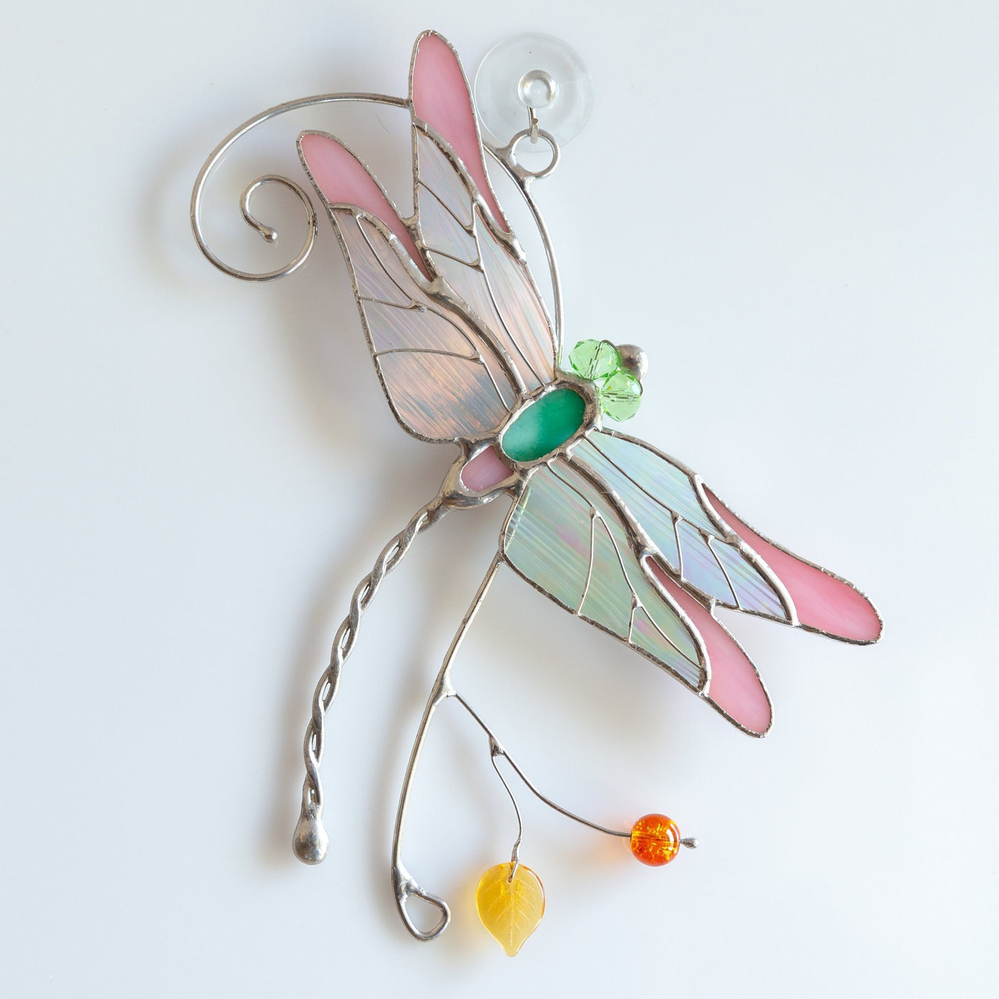 Pink dragonfly with iridescent wings stained glass window hanging