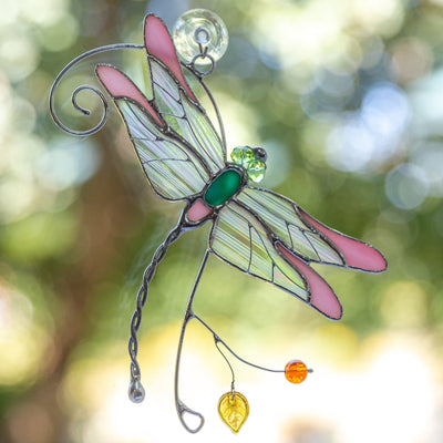 Pink stained glass dragonfly with iridescent wings suncatcher