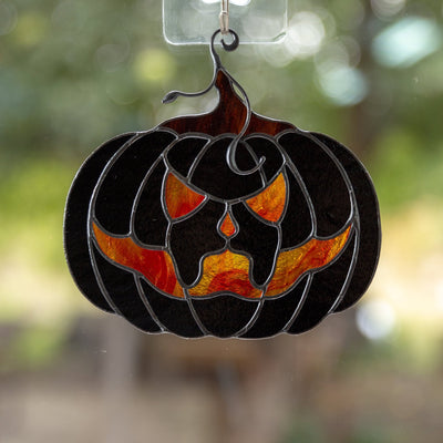 Black pumpkin with creepy face - Halloween stained glass suncatcher
