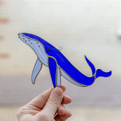 Royal blue stained glass whale with tail up window hanging for home decor