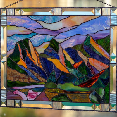 Zoomed stained glass Three Sisters Mountains window hanging
