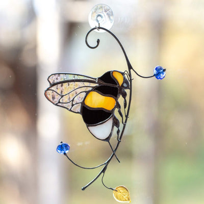 Stained glass suncatcher of a bumblebee with clear wings