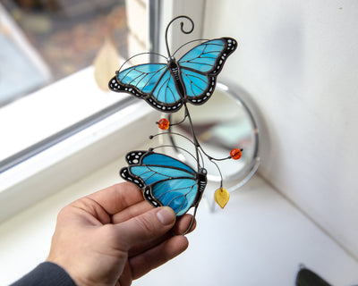 Stained glass suncatcher of Morpho butterflies