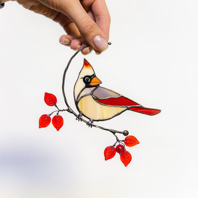 Stained glass female cardinal sitting on the branch suncatcher