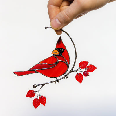 Stained glass male cardinal on the branch window hanging