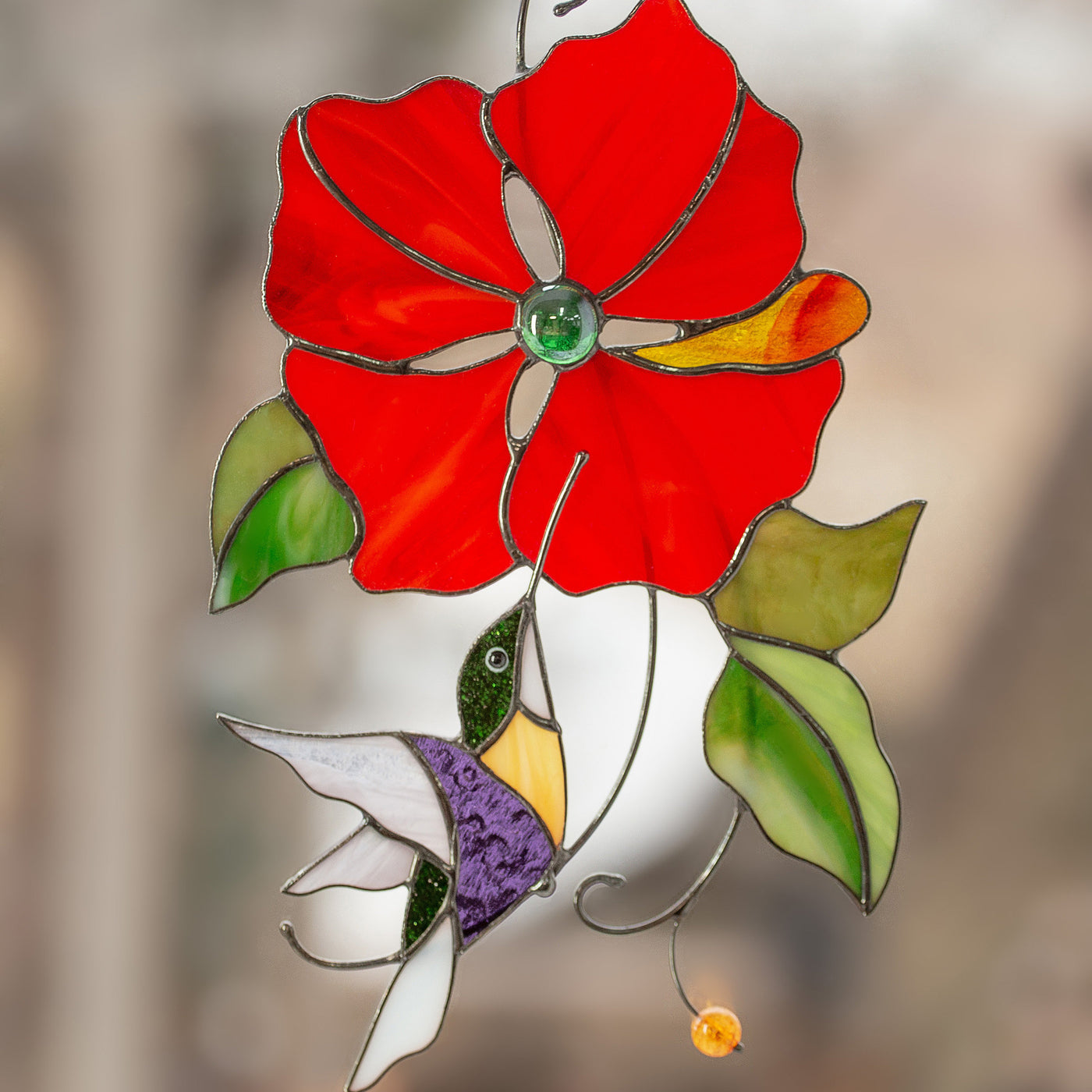 Flying towards the red flower stained glass hummingbird window hanging