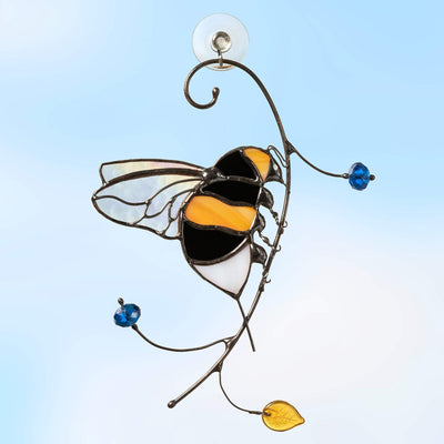 Stained glass bumblebee sitting on the branch suncatcher