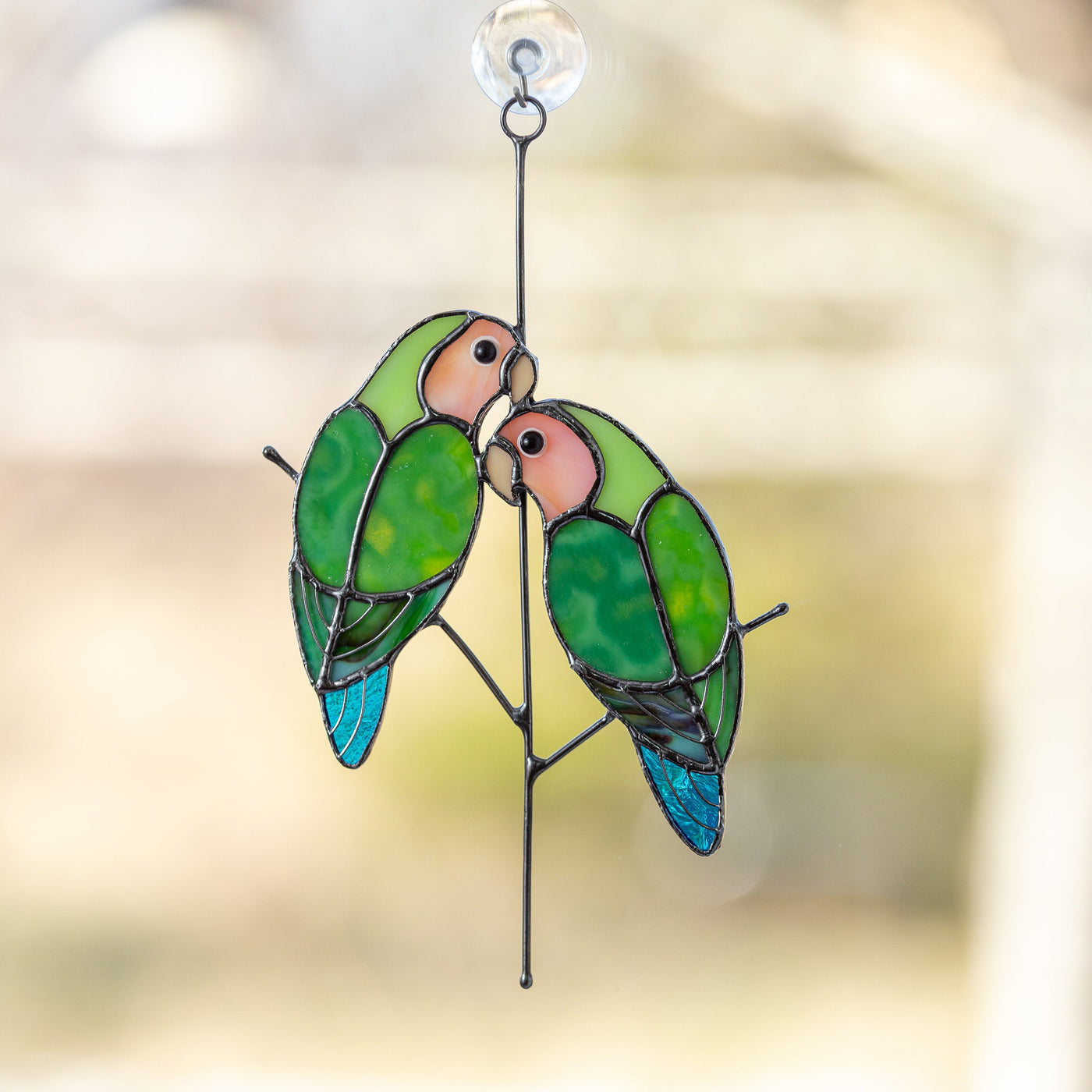 Sitting on the vertical branch stained glass lovebirds window hanging