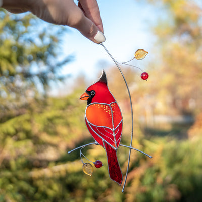 Stained glass cardinal with golden spots window hanging 