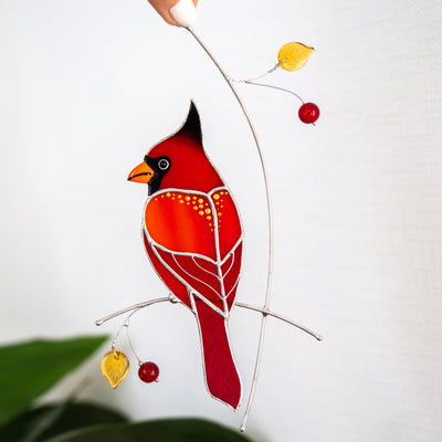 Red cardinal with golden spots suncatcher of stained glass